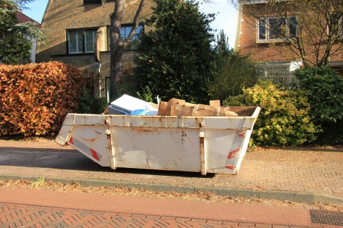 Recycling center in Merton processing old furniture.